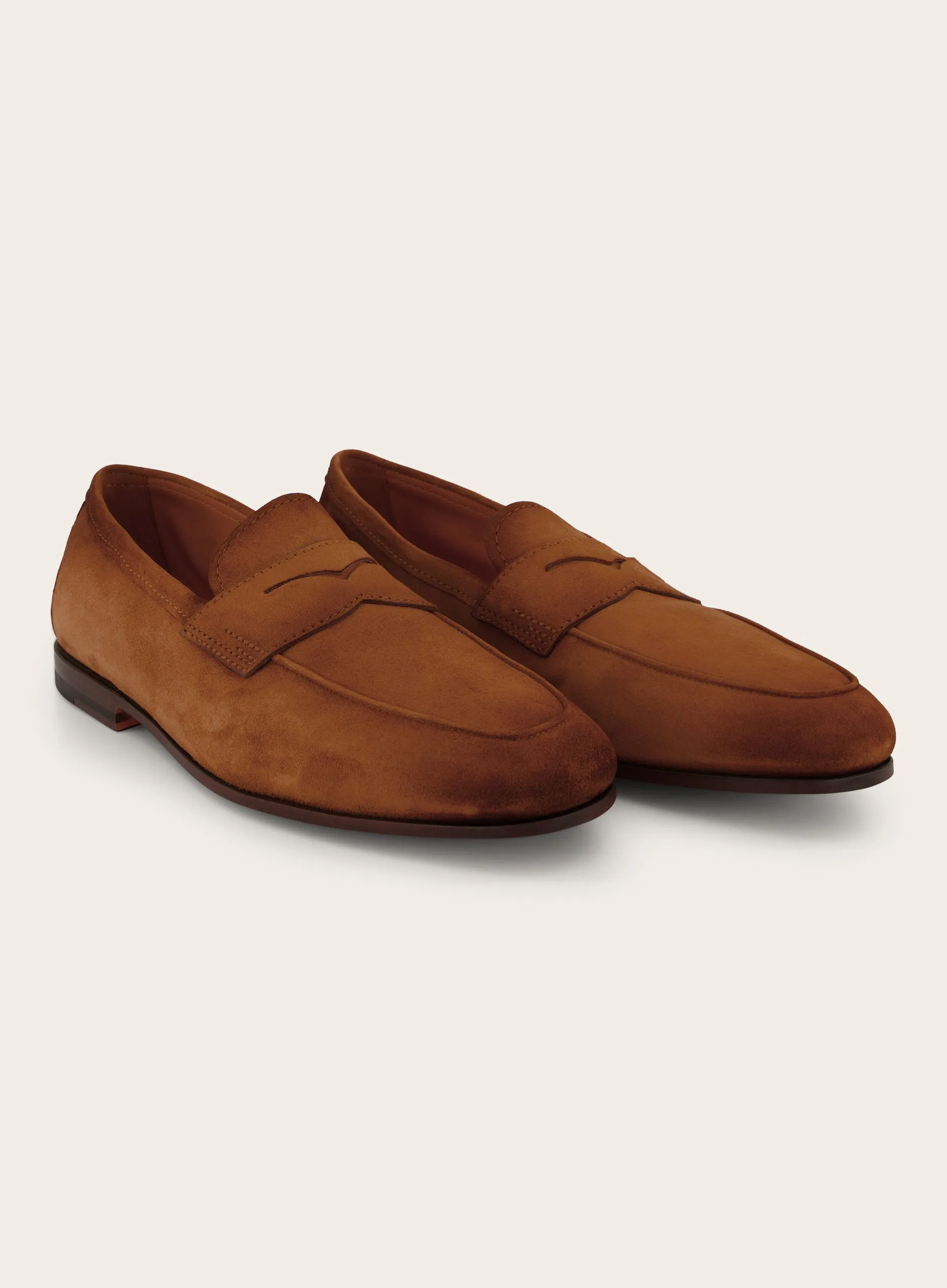 Penny loafers van suède